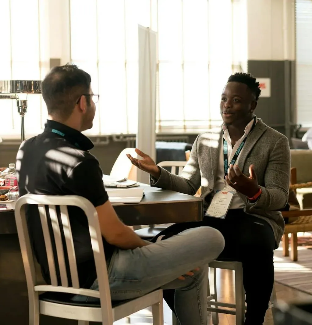 Photo of Men Having Conversation