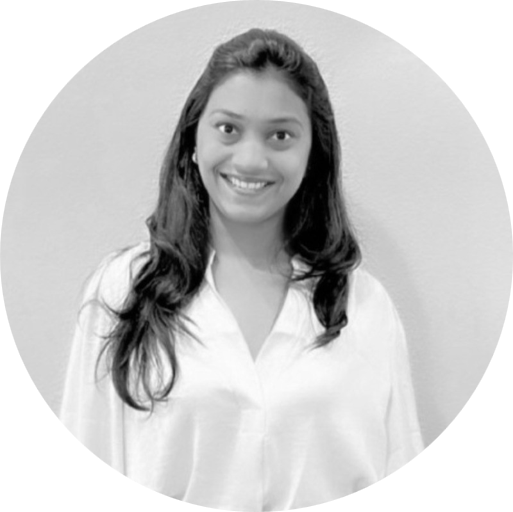 Smiling woman in a white shirt.